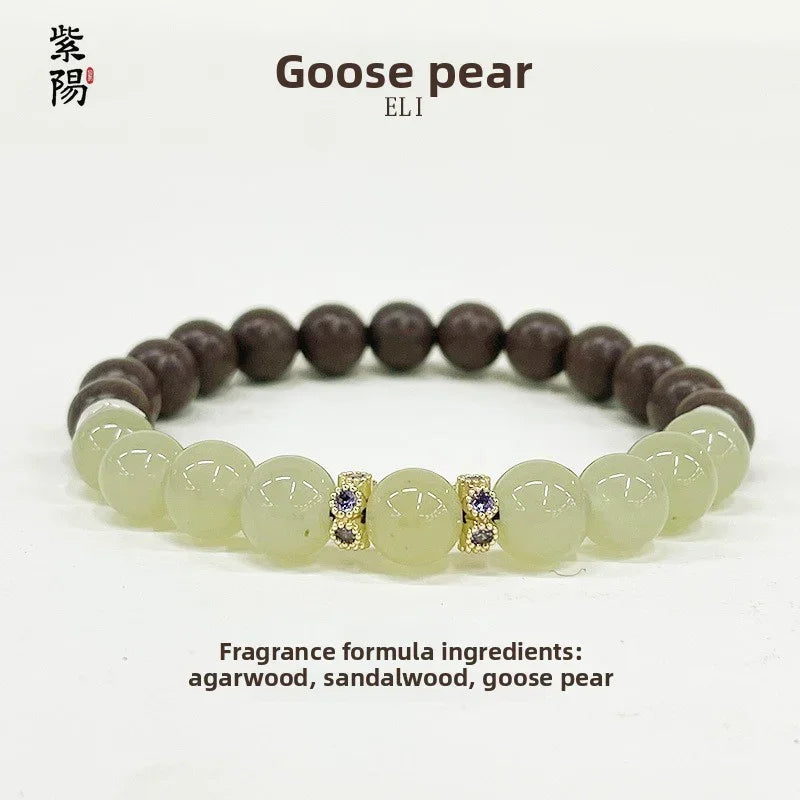 Goose pear ELI bracelet featuring light green and dark brown beads with gemstone spacers on white background