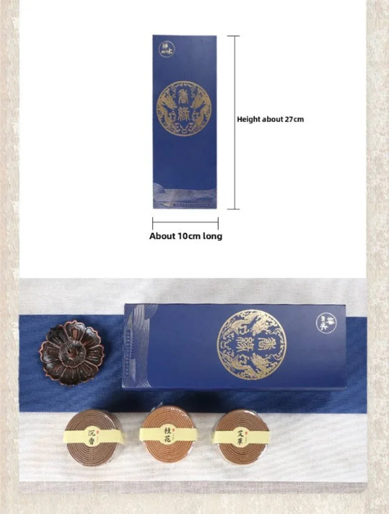 Blue incense packaging with gold dragon emblem and three spiral incense coils with labels