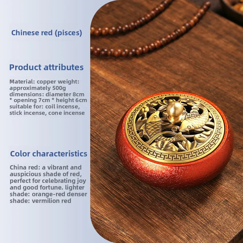 Chinese red copper incense burner with gold fish design lid on wooden tray with beaded necklace