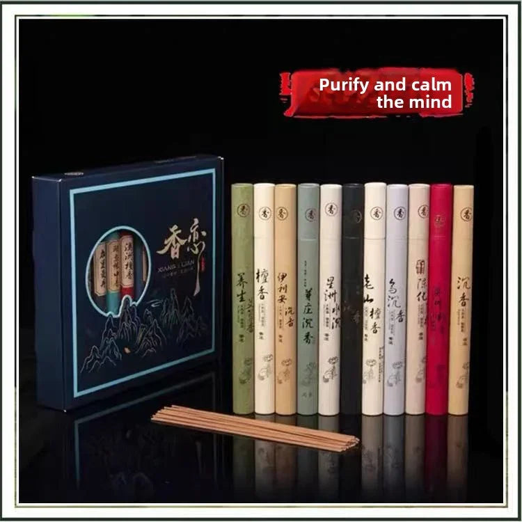 Set of traditional Chinese incense sticks in colorful tubes with calligraphy and elegant dark blue packaging, promoting relaxation