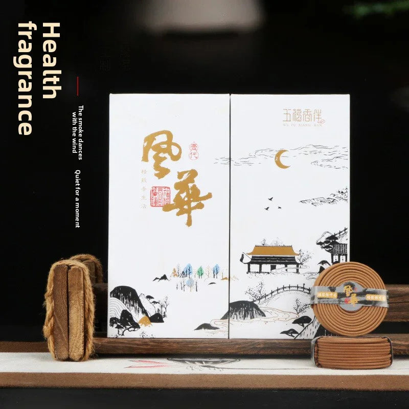 Traditional Chinese incense coils and packaging with calligraphy and landscape art for health fragrance