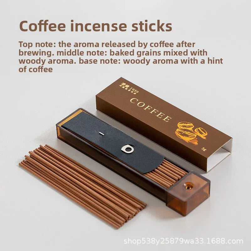Coffee incense sticks in brown packaging with gold lettering and coffee bean illustration on light background