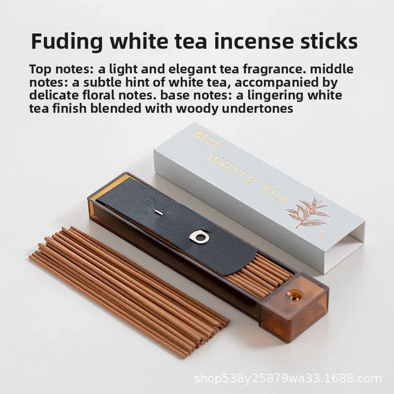 Fuding white tea incense sticks with elegant packaging and wooden incense holder on white background