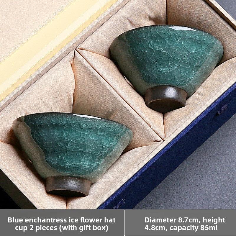 Pair of blue crackle-glazed flower hat cups in beige cushioned gift box