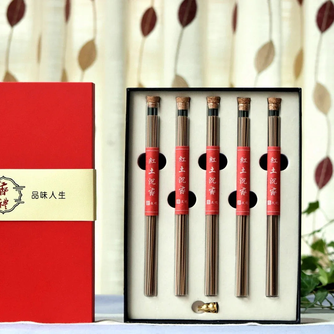 Set of five incense stick bundles in glass tubes with corks, arranged in a black box with a red and cream sleeve featuring Chinese characters