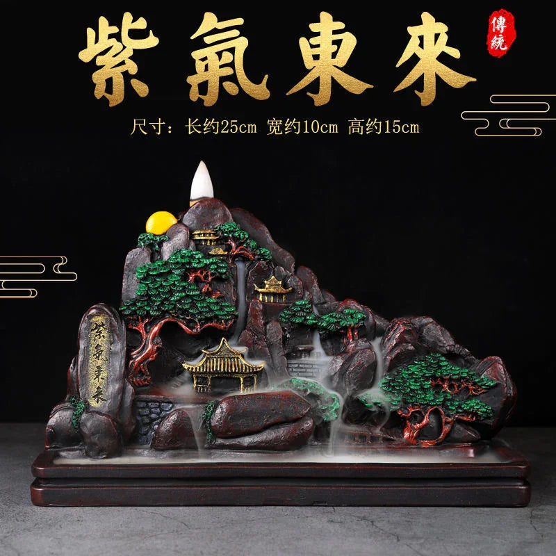 Chinese mountain incense burner with green trees, gold pagodas, and mist effect on wooden base