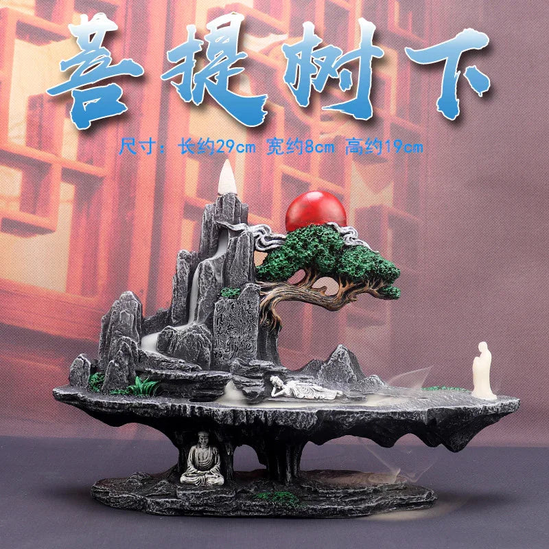 Decorative incense burner with mountain, bonsai tree, red orb, Buddha statues, and mist effect