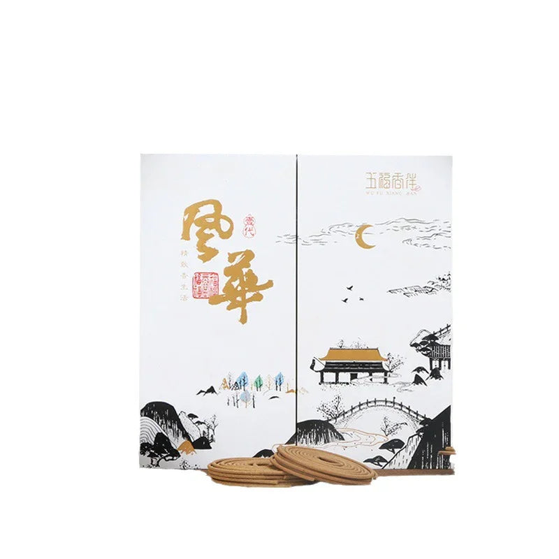 Traditional Chinese incense coils with elegant white and gold packaging featuring landscape and calligraphy designs