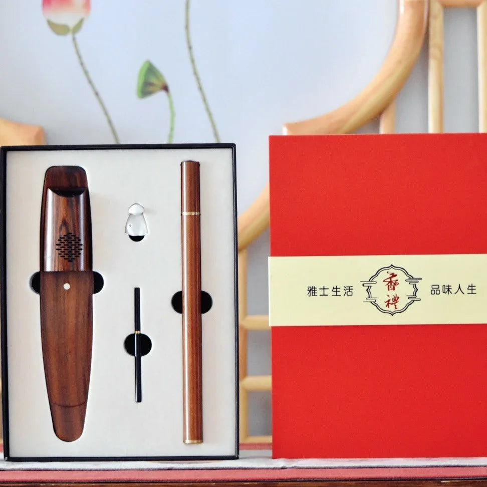 Wooden incense holder gift set with red box and Chinese calligraphy on a table